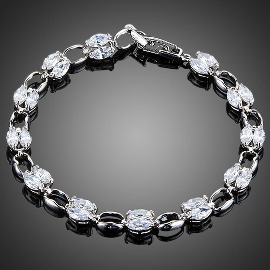 KHAISTA platinum crystal toggle bracelet on white background
