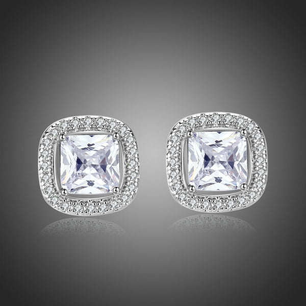 KHAISTA prong set square crystal stud earrings on white background