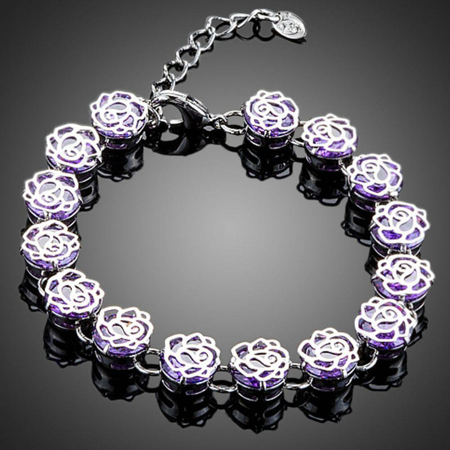 KHAISTA purple crystal clasp bracelet on white background