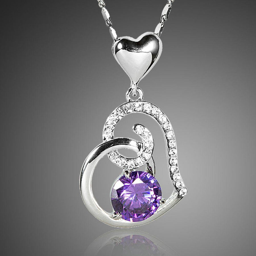 KHAISTA purple heart pendant chain necklace on white background