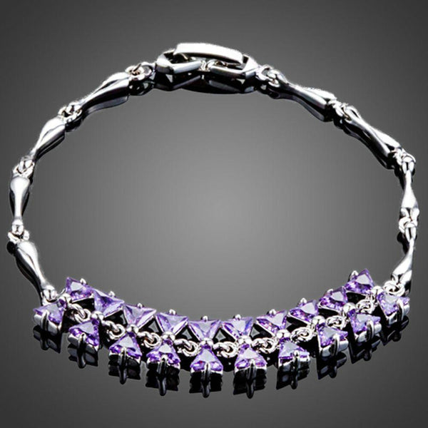 KHAISTA purple crystal bow knot bracelet on white background