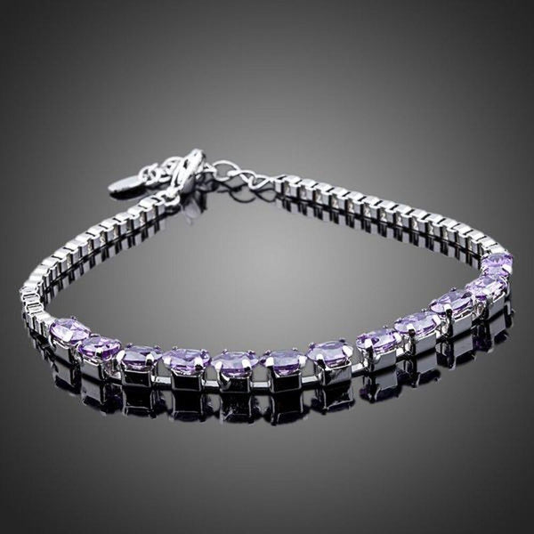 KHAISTA purple CZ link chain bracelet on white background