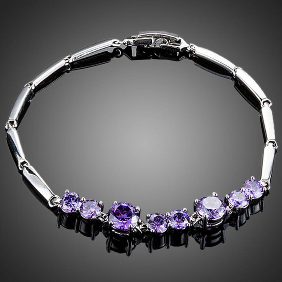 KHAISTA purple CZ toggle clasp bracelet on white background