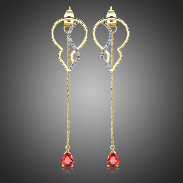 KHAISTA red CZ long drop earrings on white background