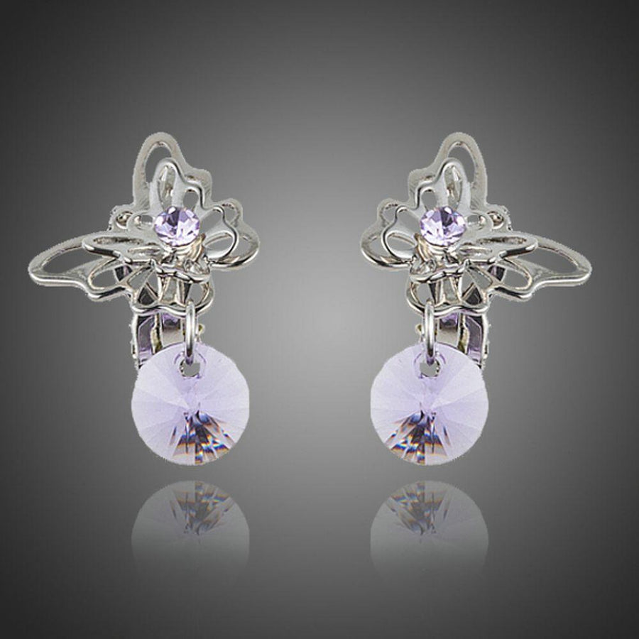 KHAISTA rhinestone butterfly clip earrings on white background