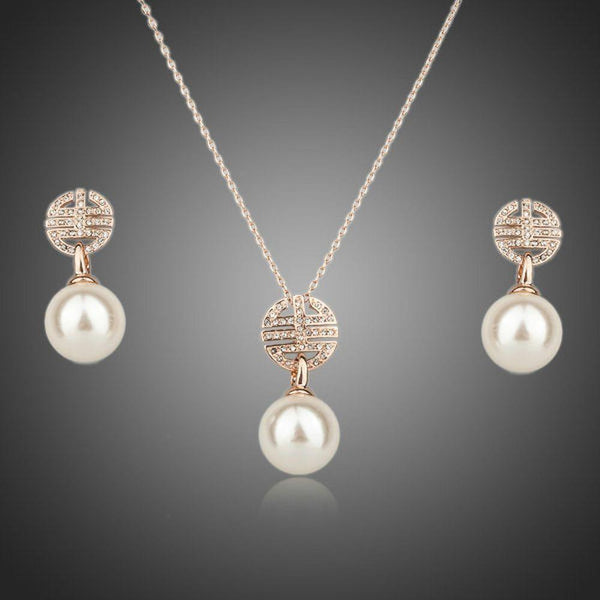 Khaista rose gold Austrian crystal pearl jewellery set on white background