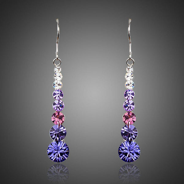 KHAISTA round crystal drop earrings on white background