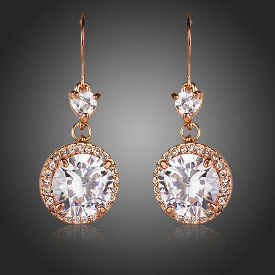 KHAISTA round CZ fashion drop earrings on white background