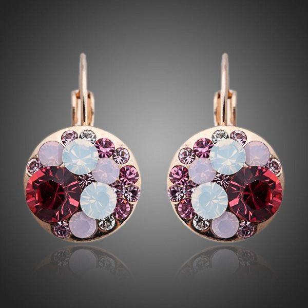 KHAISTA deep red round crystal clip earrings on white background