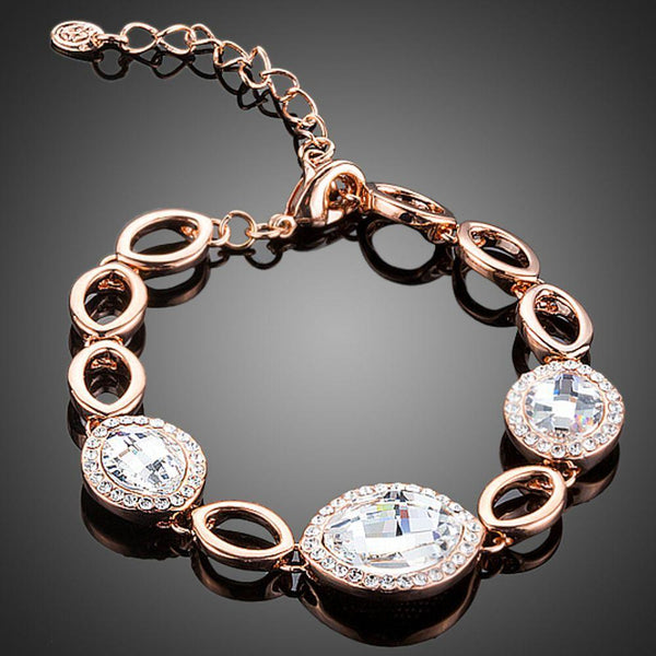 KHAISTA round rhinestone link chain bracelet on white background