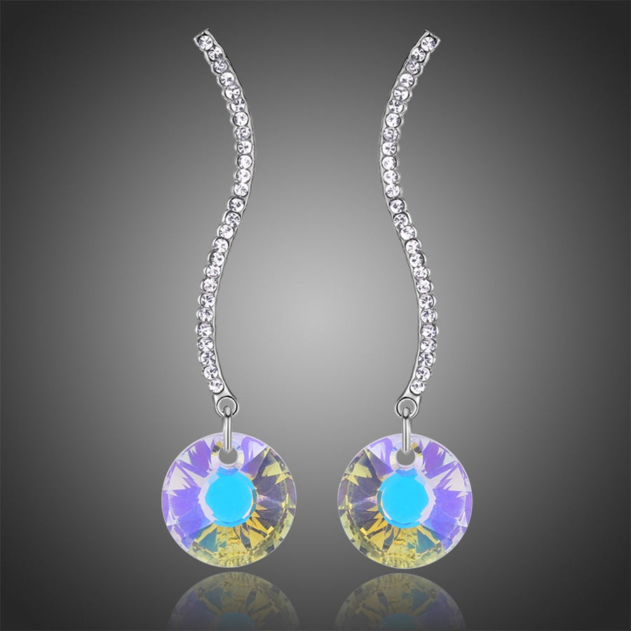 KHAISTA shiny arc long dangle drop earrings on white background