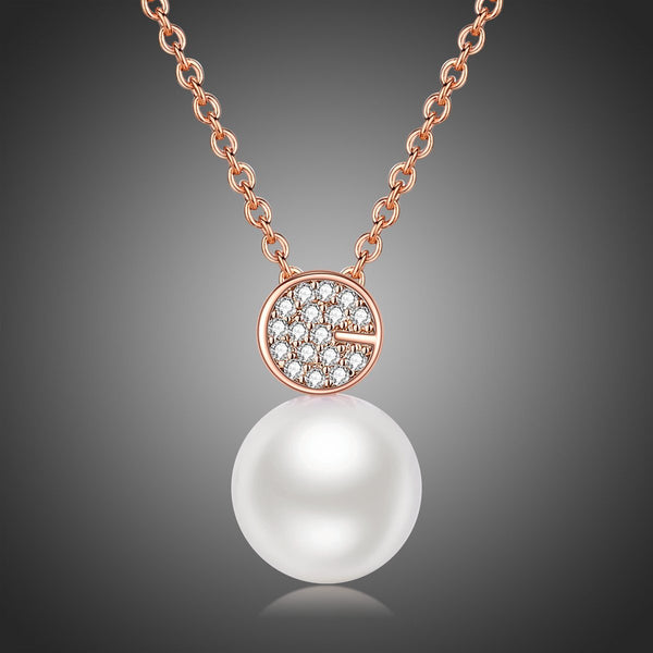 KHAISTA simulated pearl dazzling pendant necklace on white background