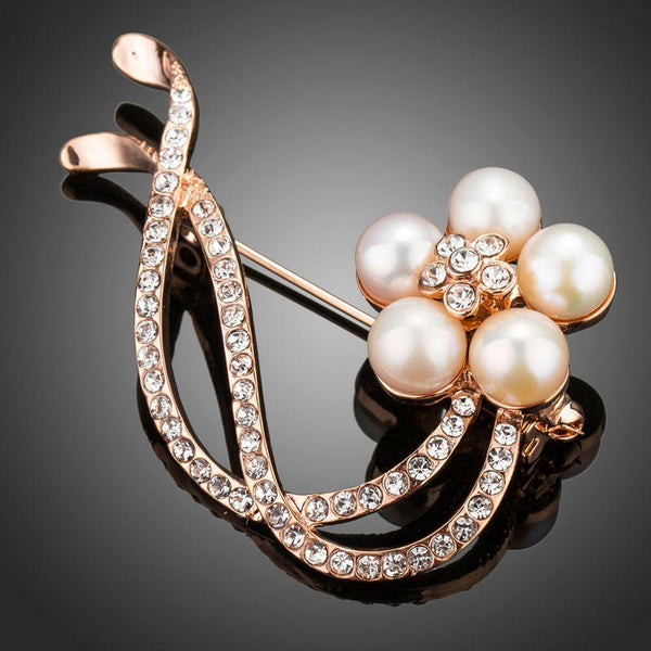 Khaista simulated pearl flower brooch on white background