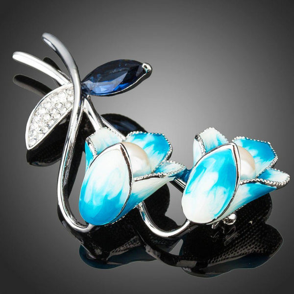 Khaista sky blue oil paint flower brooch on white background