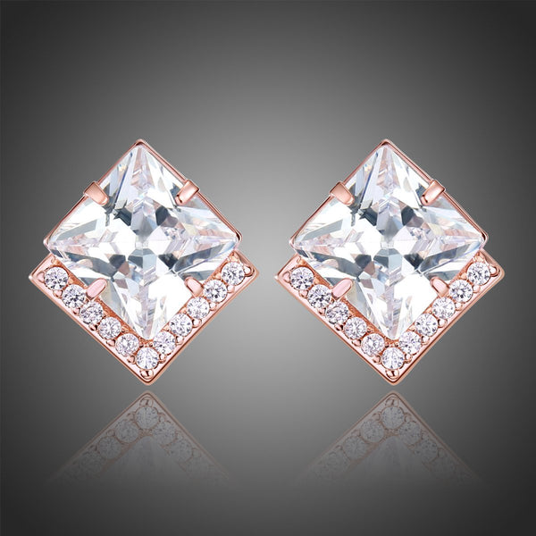 KHAISTA square cut CZ stud earrings on white background