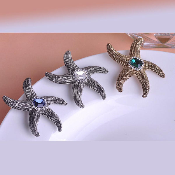 Khaista crystal starfish brooch pin on white background