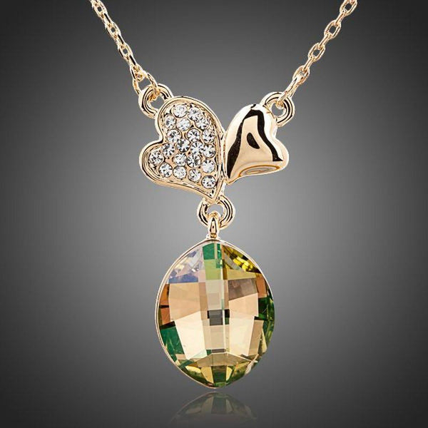 KHAISTA two leaf clover crystal pendant necklace on white background