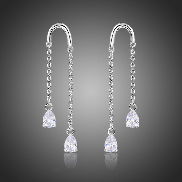 KHAISTA U-shape pear cut crystal earrings on white background