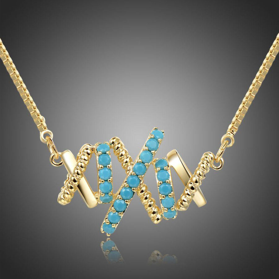 KHAISTA vintage letter X pendant necklace on white background