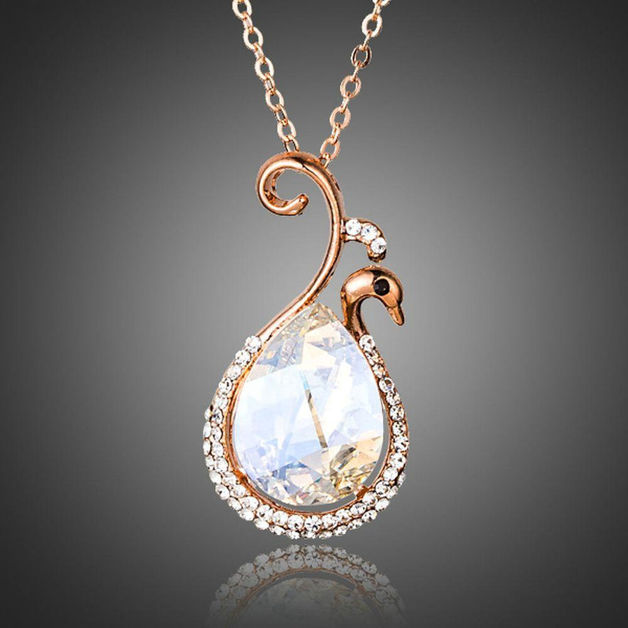 KHAISTA waterdrop peacock crystal pendant necklace on white background