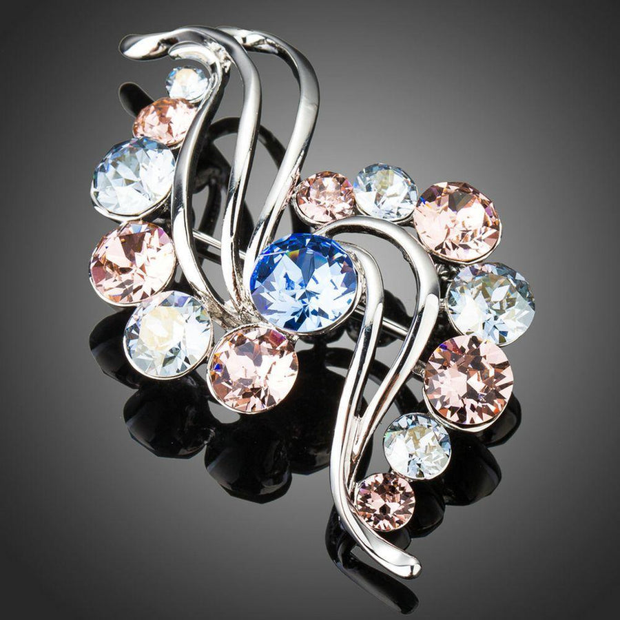 Khaista crystal wave shape scarf brooch on white background
