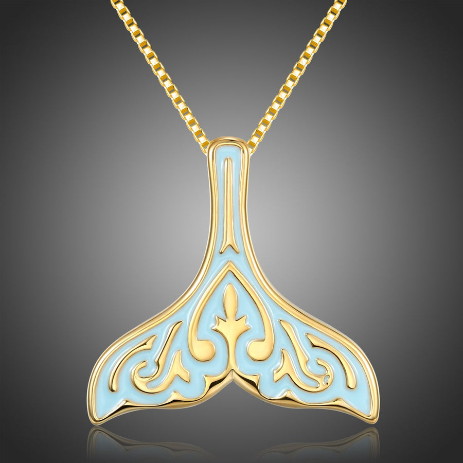 KHAISTA crystal whale fluke pendant necklace on white background