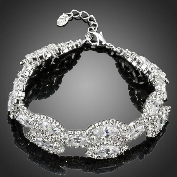 KHAISTA white gold CZ tennis bracelet on white background