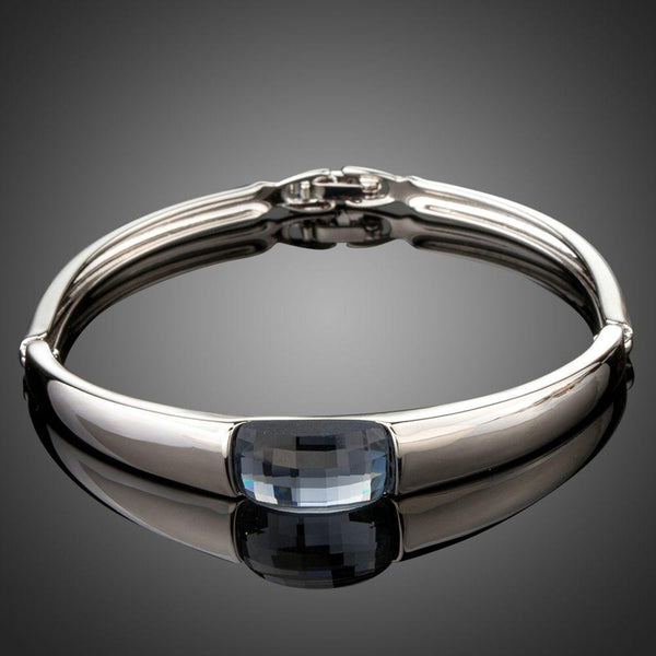 KHAISTA white gold geometric crystal bangle on white background