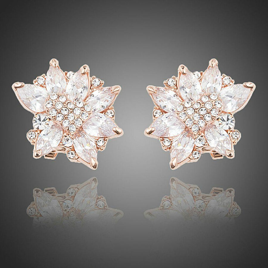 KHAISTA white rose CZ stud earrings on white background