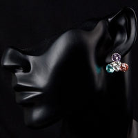 Close up of KHAISTA Stellux Austrian crystal flower stud earrings
