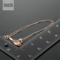Pendant detail on KHAISTA champagne crystal crab pendant necklace