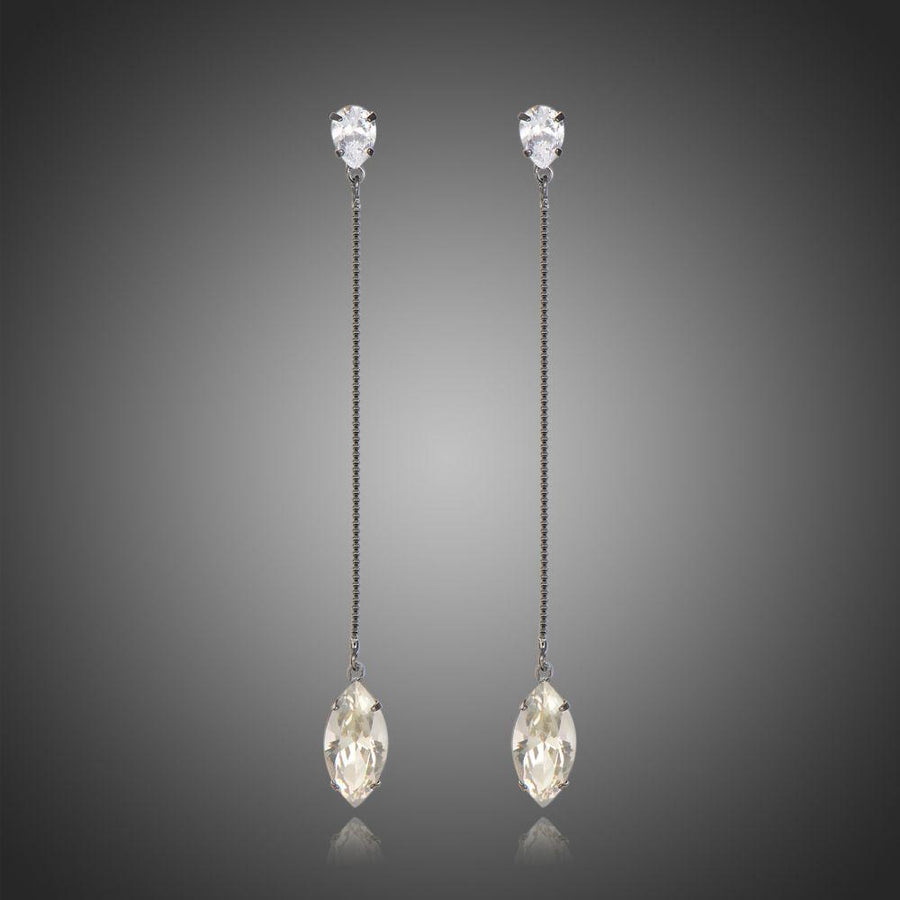 KHAISTA AAA CZ marquise dangle earrings on white background