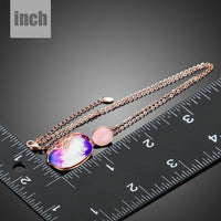Pendant detail on KHAISTA artist paint crystal pendant necklace