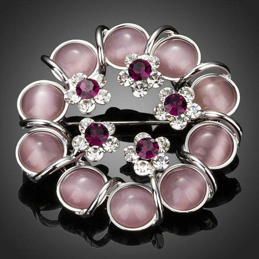 Khaista artistic beads and flowers brooch on white background