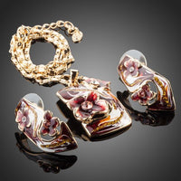 Close-up of deep red crystals on Khaista floral set
