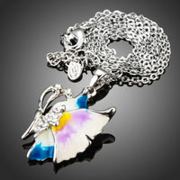 Side angle view of KHAISTA artistic crystal butterfly necklace