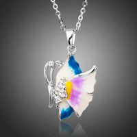 KHAISTA artistic crystal butterfly necklace on white background
