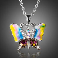 KHAISTA artistic crystal butterfly pendant necklace on white background