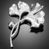 Close-up of pink crystals on Khaista flower brooch