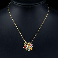 Close up detail of KHAISTA artistic multicolour flower crystal necklace