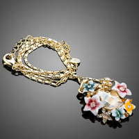 Side angle view of KHAISTA artistic multicolour flower crystal necklace