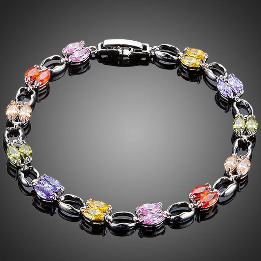 KHAISTA artistic CZ toggle bracelet on white background