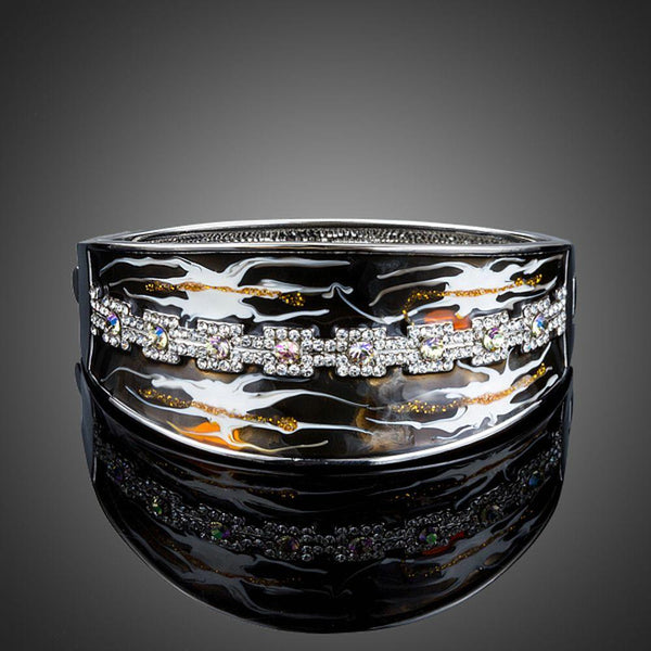 KHAISTA artistic windstorm crystal bangle on white background