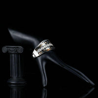 Side angle view of KHAISTA artistic windstorm crystal bangle