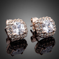 Side angle view of KHAISTA Austrian crystal rectangle stud earrings