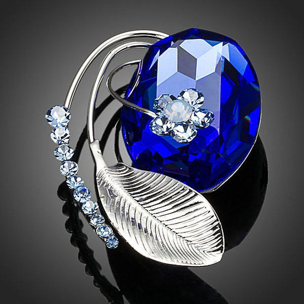 Khaista banana leaf blue crystal flower brooch on white background