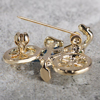 Close-up of crystals on Khaista bicycle brooch