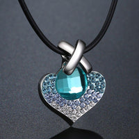 Pendant detail on KHAISTA large blue Austrian crystal heart necklace