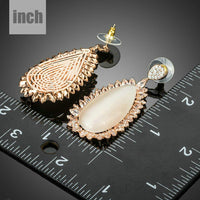 large opal waterdrop earrings detail view by KHAISTA