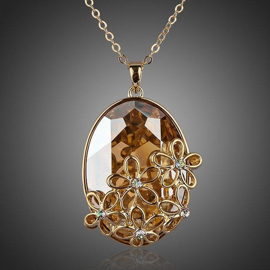 KHAISTA large oval champagne crystal flower necklace on white background